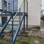 Metal balcony with access stairs