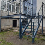 Metal balcony with access stairs