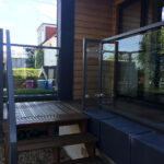 Steel balustrades and bespoke glass panel